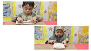 anak alumna melipat kain lap