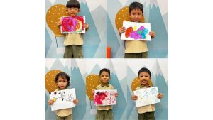 Anak alumna memamerkan hasil karya menggambar bebas